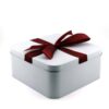 Festliche quadratische Geschenkdose aus Blech mit echter Schleife "Merci"